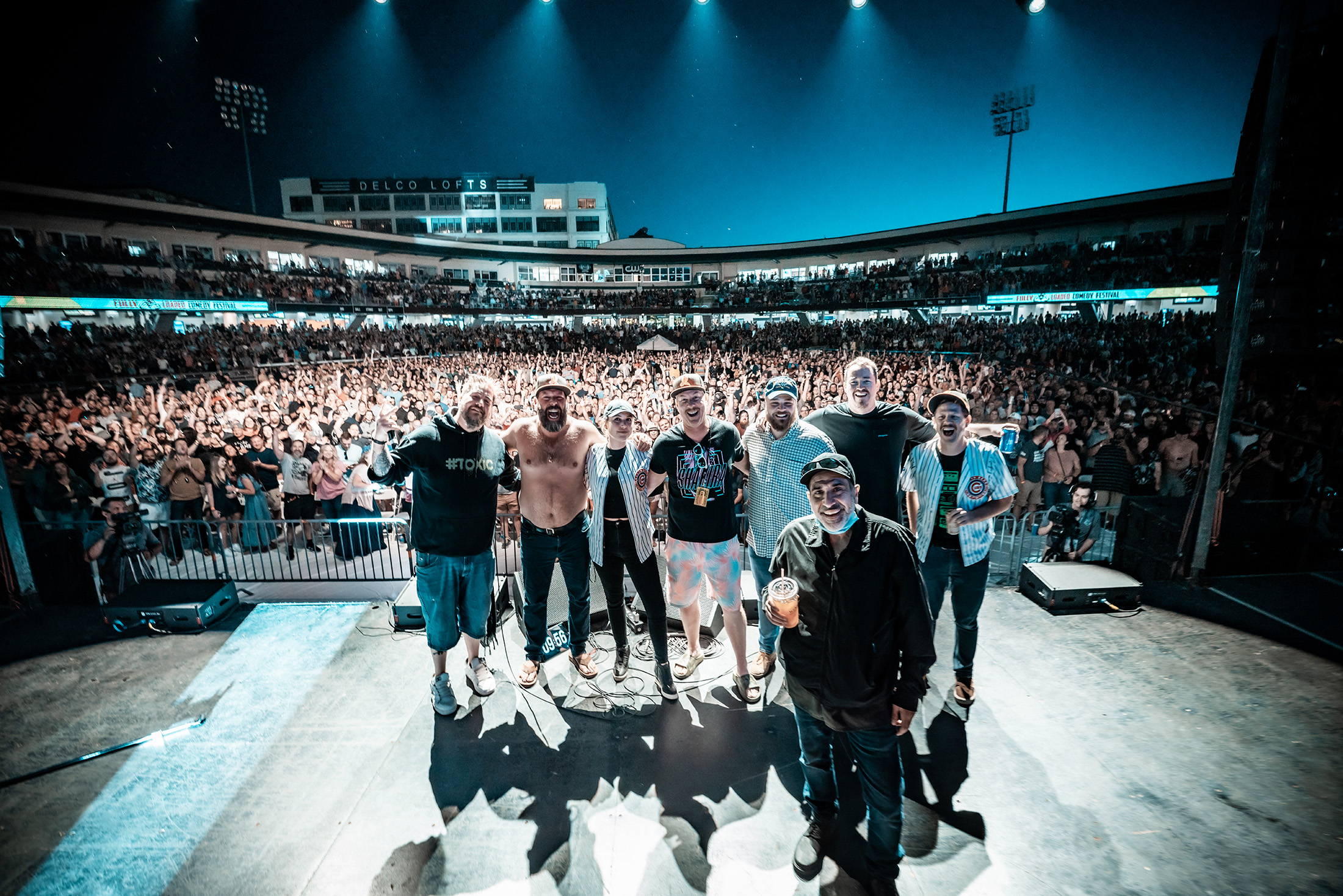 Big Jay Oakerson, Bert Kreischer, Taylor Tomlinson, Dave Williamson, Aaron Weber, Shane Gillis, Dustin Nickerson, and Dave Attell (front) at Day Air Ballpark in Dayton, OH on June 18, 2022. 