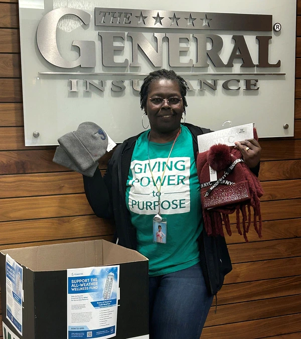 Customer Service Manager Angelique 'Angie' Walker delivers a generous donation to the All Weather Wellness Fund on December 17th, supporting Nashville General Hospital Foundation's mission for community wellness for all.