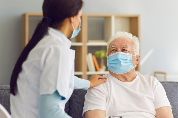 nurse comforting patient