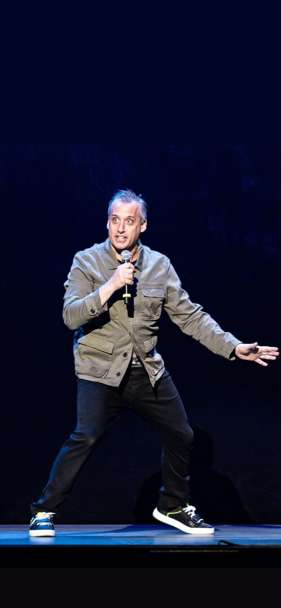 Image of Joe Gatto performing on stage