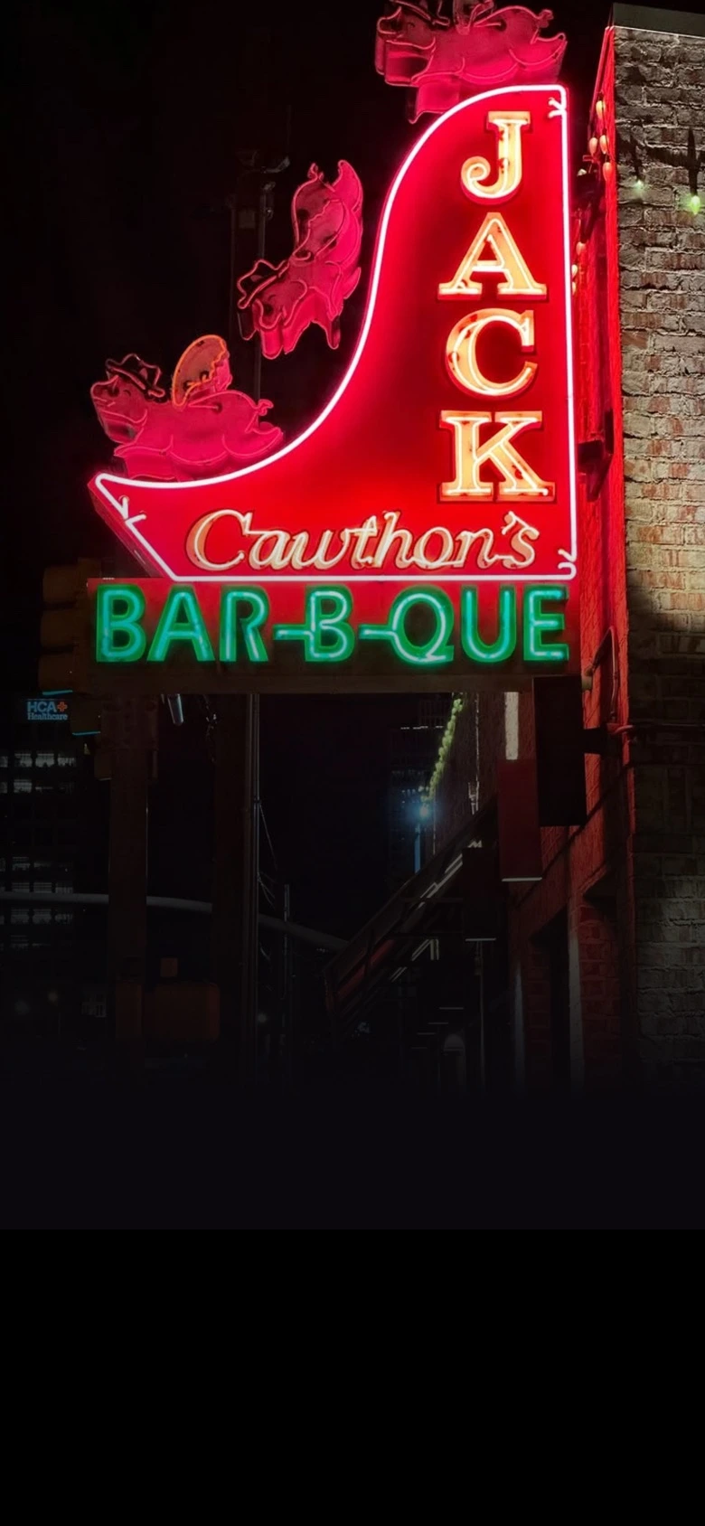 Jack's Barb-b-que sign at night