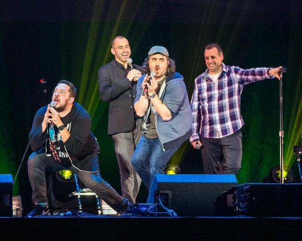 Impractical Jokers on stage performing
