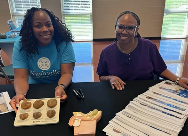 Shatika Phillips, Clinical Research Nurse Coordinator, and Ashia Cooper-Colquitt, MHA, BSN, RN, Sr Director of Clinical Operations, NHC, at at Lake Providence Missionary Baptist Church.