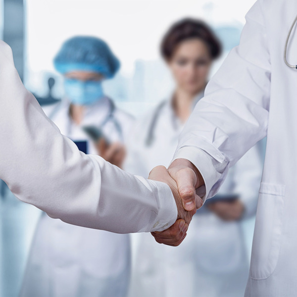 physicians shaking hands
