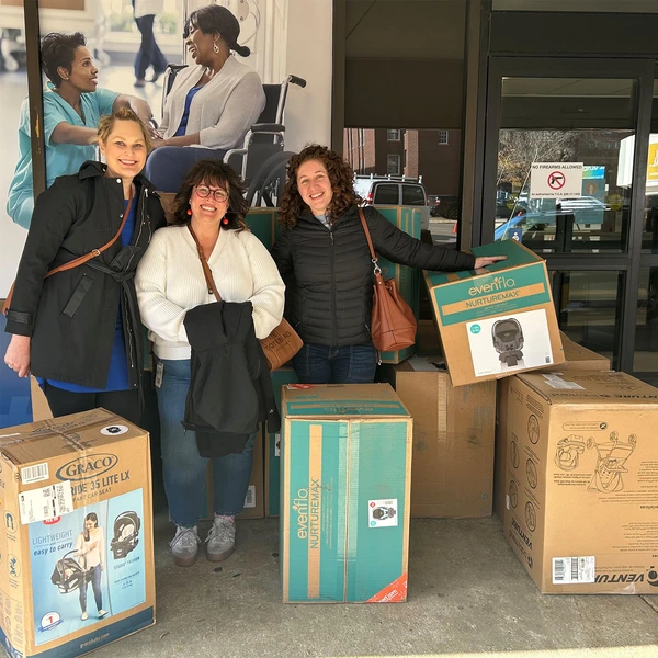 Mitsui USA employees Bailey Veach, Jessica Redman, and Zoe Teets (with Karen Bateman not pictured) visited Nashville General Hospital to deliver these special "safety care packages" of car seats.