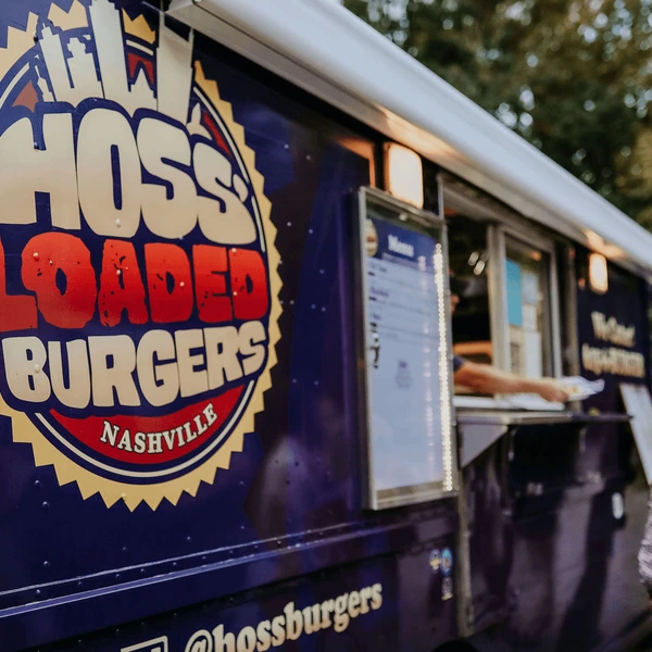 Hossburgers food truck serving customers