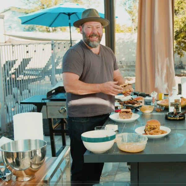 Bert Kreischer preparing a meal