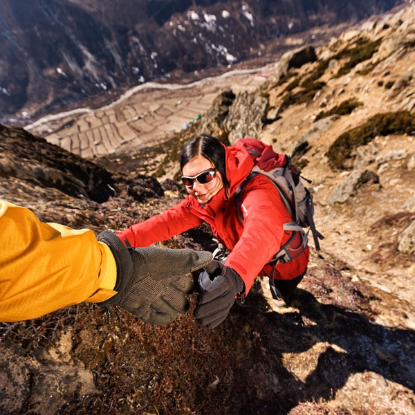 Woman climbing in Mount Everest National Park, Nepal. Mount Everest National Park